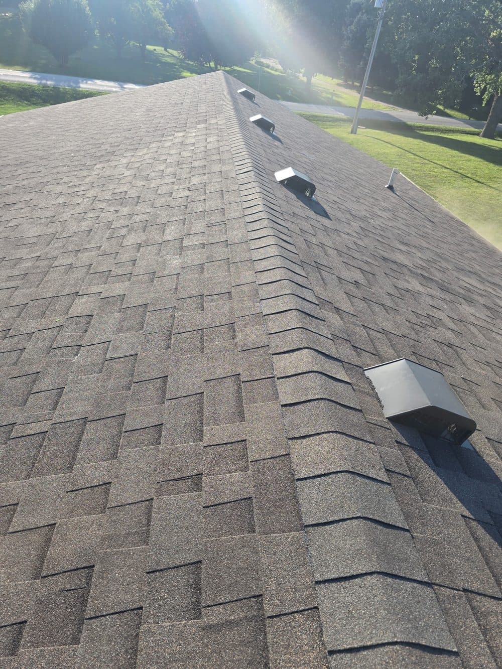 After: completed shingle roof
