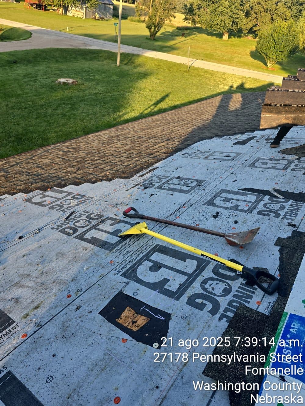 Mid-repair: roof deck with underlayment installed