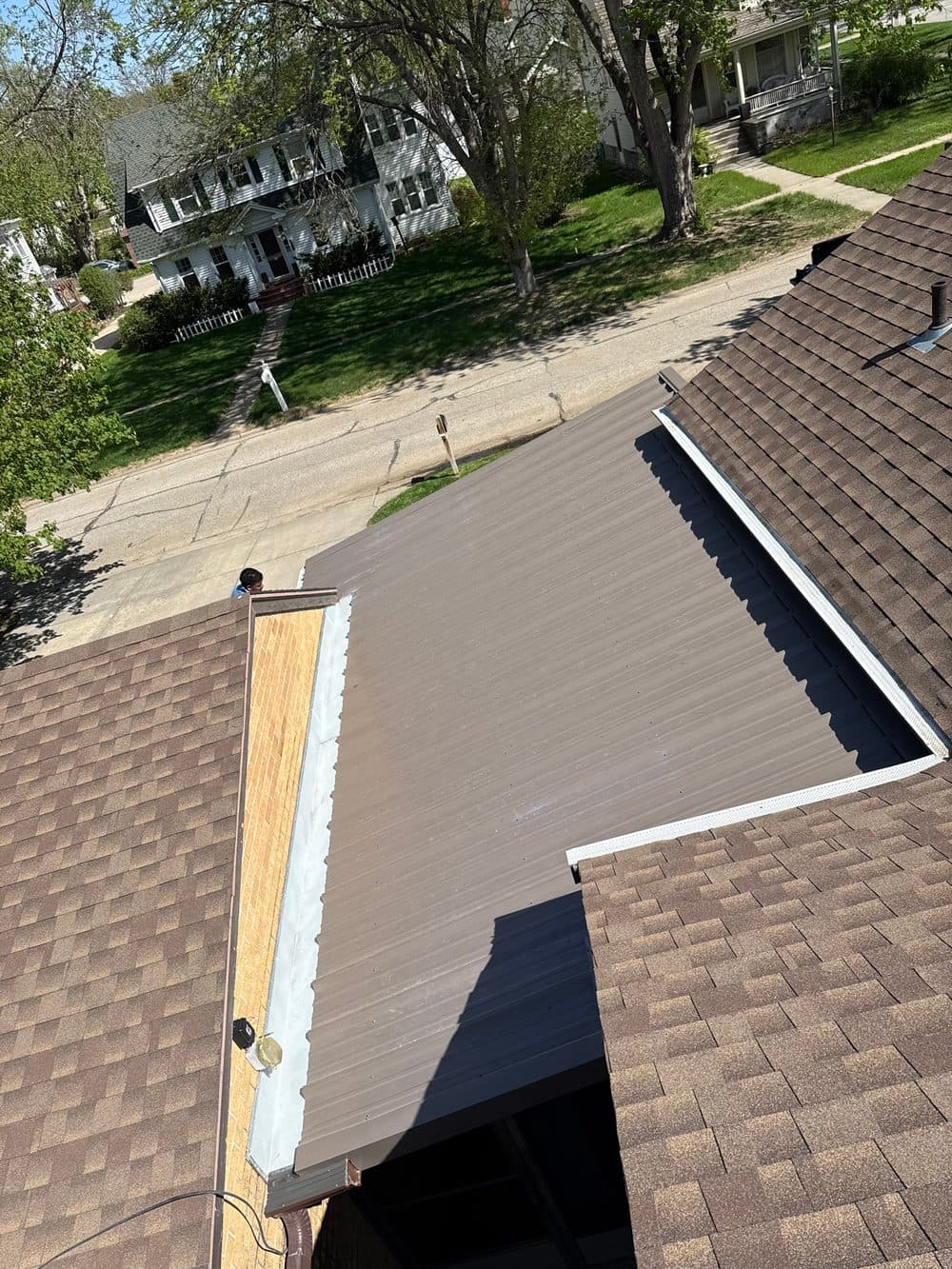 After: new matching shingle roof