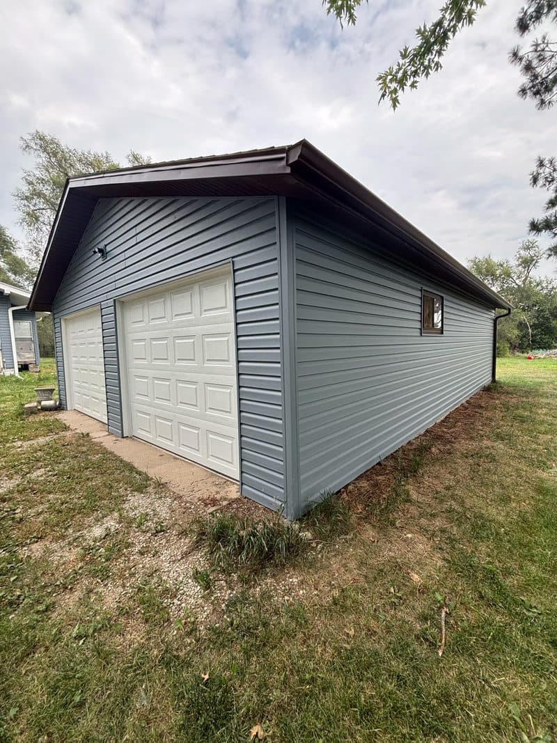 Completed blue-gray garage siding, Nickerson NE